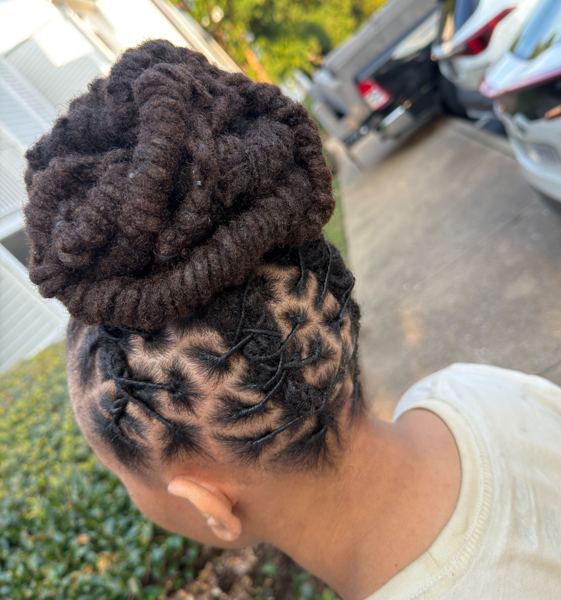Loc style by Crowned Essence