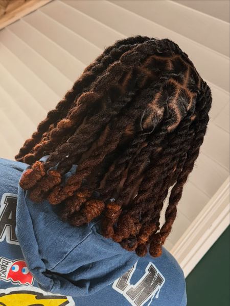 Loc style by Crowned Essence